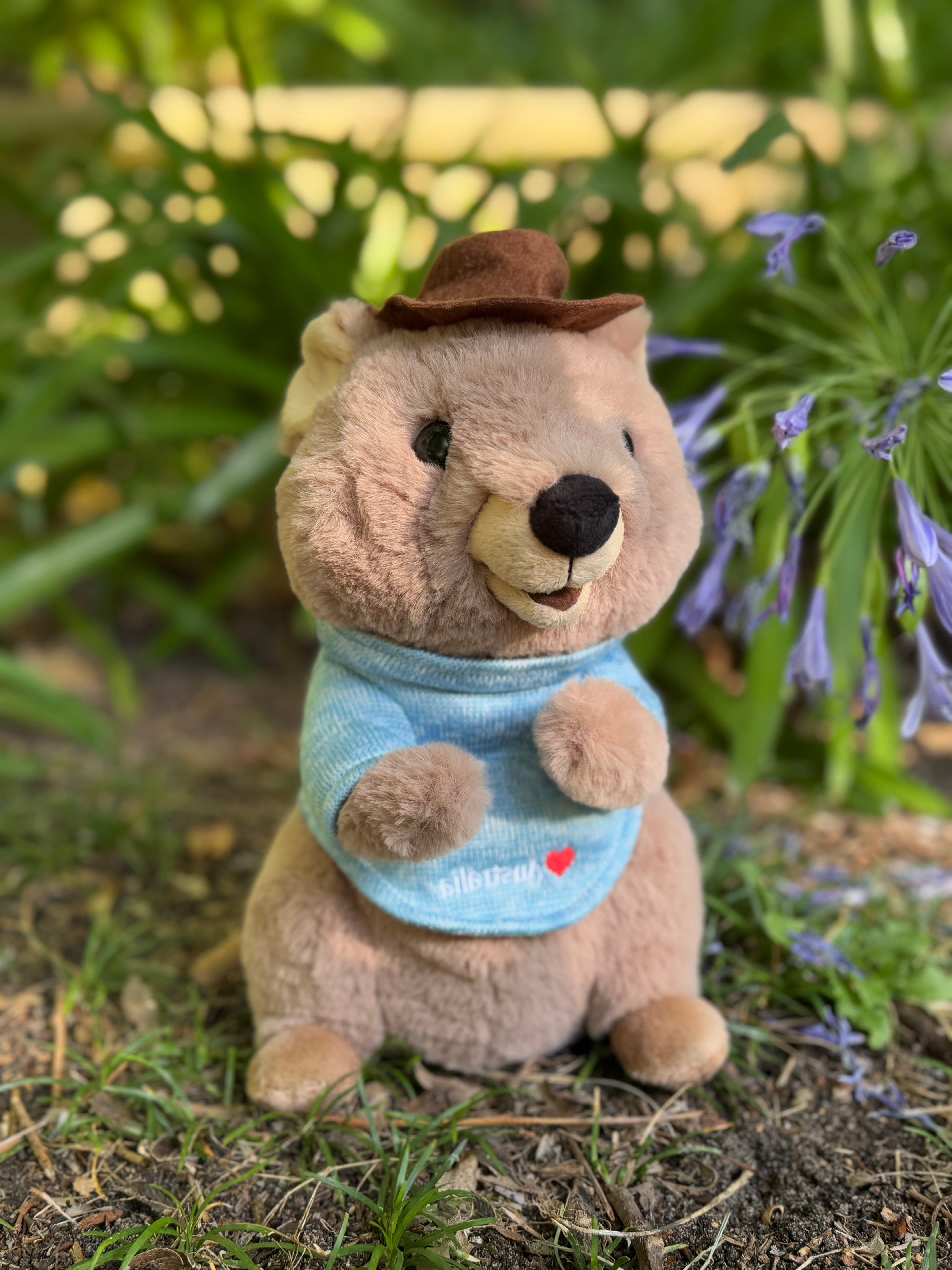 25cm Mokka the Quokka plush toy side view from Perth, Western Australia – inspired by Rottnest Island Quokkas, the smiling Australian marsupials known as the happiest animals on Earth.