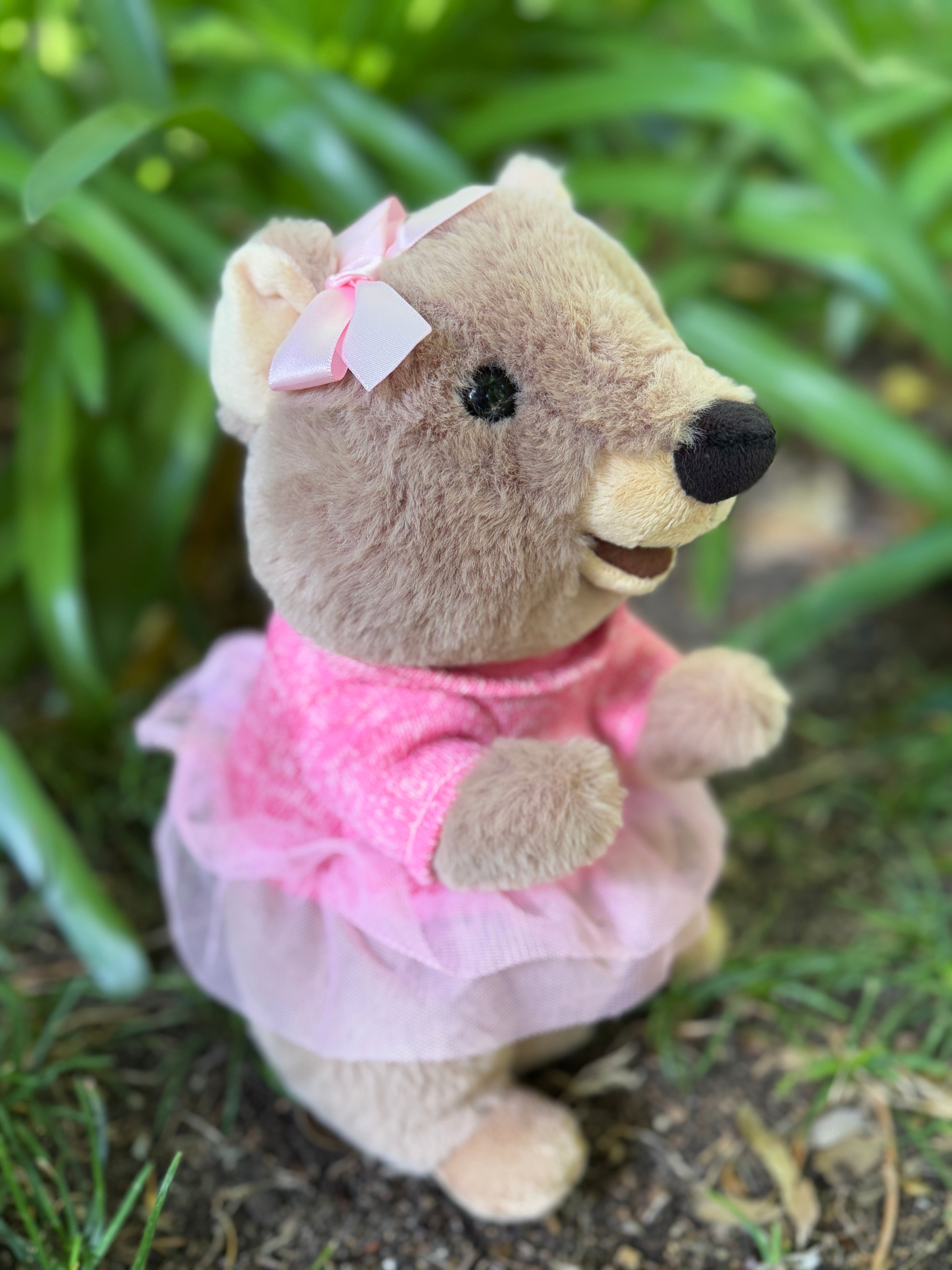 Marlie the Quokka plush toy from Perth featuring a close-up of her pink bow tie – adorable Rottnest Island Australian souvenir.