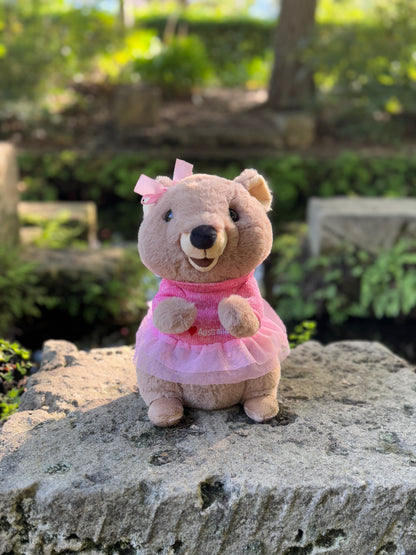 25cm Mikka the Quokka plush toy from Perth bathing in warm sunlight – inspired by Rottnest Island’s happiest animal on Earth, a cute Australian souvenir.